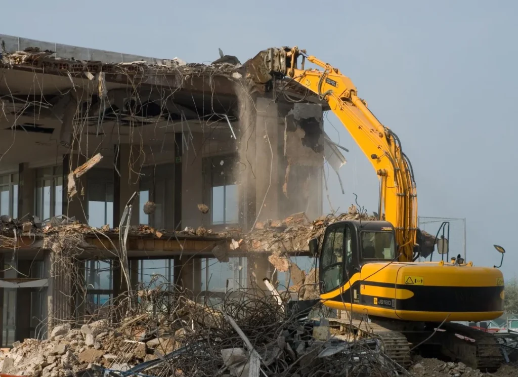 Construction equipment removing debris